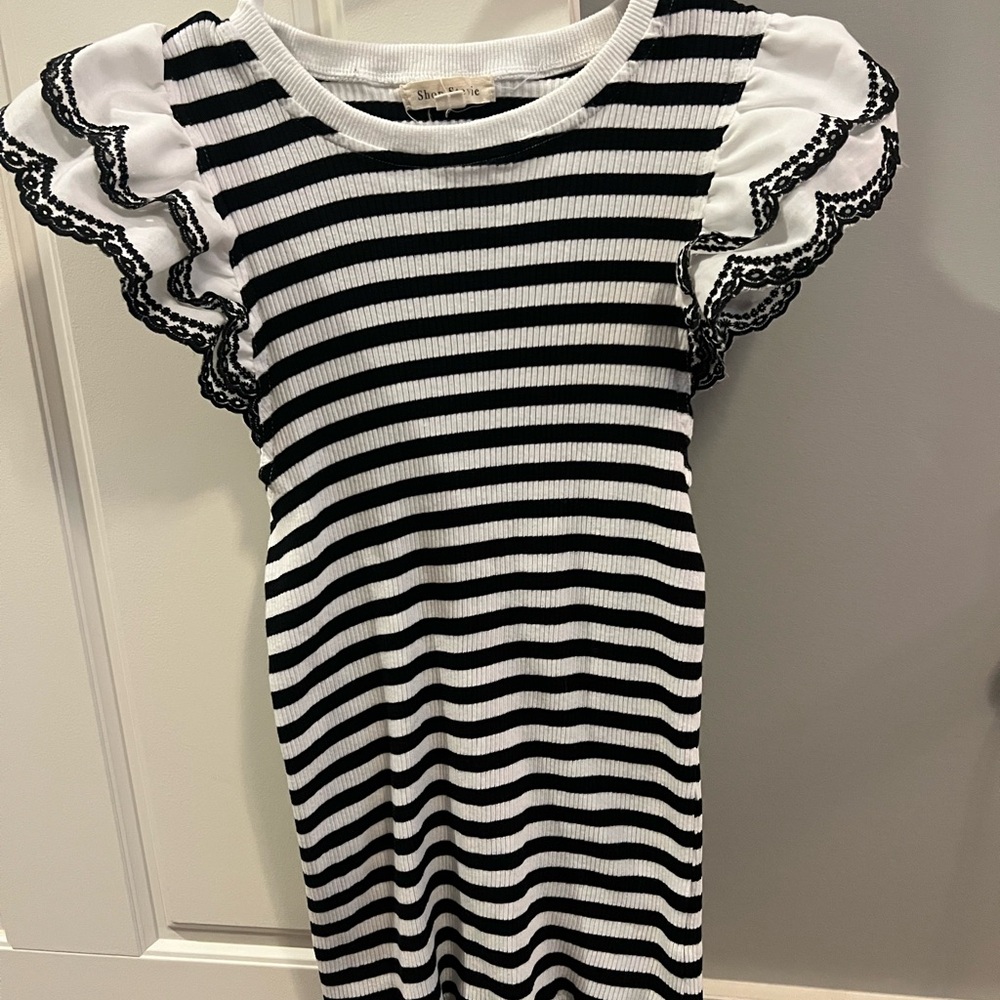 Shop Stevie Black and White Striped Tee with Ruffled Shoulders